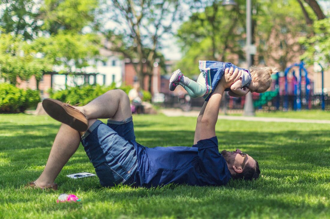 A Father And His Child Enjoying The Fresh Mowed Grass By Atlanta Landscape Co A Father And His Child Enjoying The Fresh Mowed Grass By Atlanta Landscape Co